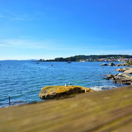 Galihost - Casa Banada Por El Mar En