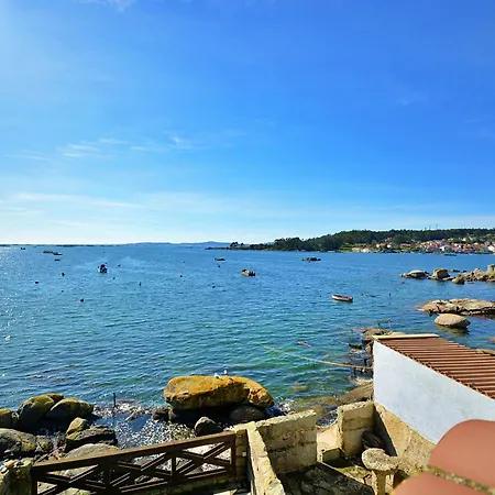 Galihost - Casa Banada Por El Mar En *
